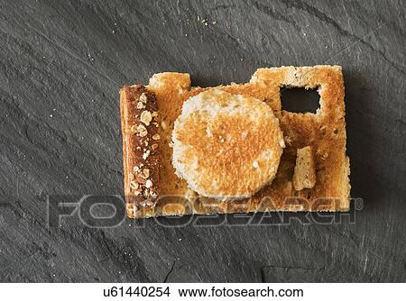 Picture - Camera shaped toast bread on table. Fotosearch