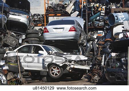 Cars in junk yard View Large Photo Image Stock Photo - Cars in junk yard. Fotosearch