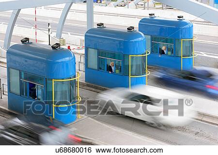 Cars travelling through toll booth at bridge, high angle view View Large Photo Image Stock Photograph - Cars travelling through toll booth at bridge, high angle view. Fotosearch