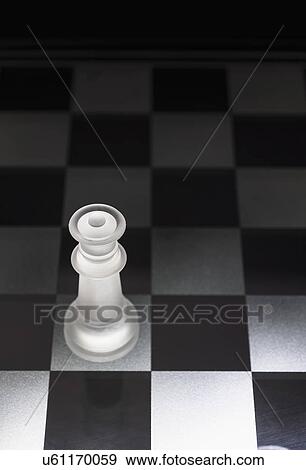 Stock Photo - Chess queen on chess board. Fotosearch