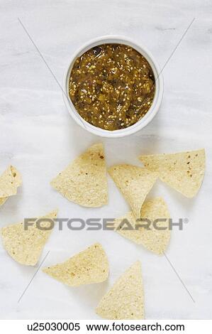 Chips with tomato sauce View Large Photo Image Stock Photography - Chips with tomato sauce. Fotosearch