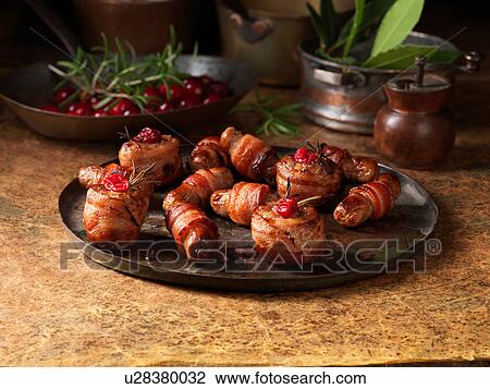 Christmas, celebration food, garnish selection, pigs in blankets, cranberries, rosemary View Large Photo Image Stock Image - Christmas, celebration food, garnish selection, pigs in blankets, cranberries, rosemary. Fotosearch