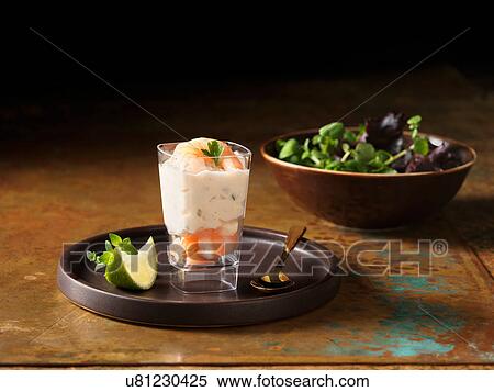 Christmas, celebration food, prawn and salmon appetiser, fresh slice of lime, thyme, salad leaves in bowl View Large Photo Image Stock Photography - Christmas, celebration food, prawn and salmon appetiser, fresh slice of lime, thyme, salad leaves in bowl. Fotosearch
