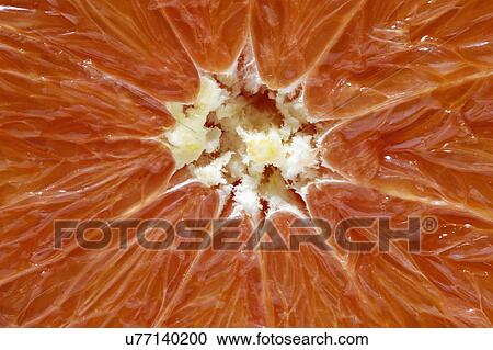 Close up of half of red orange View Large Photo Image Stock Image - Close up of half of red orange. Fotosearch