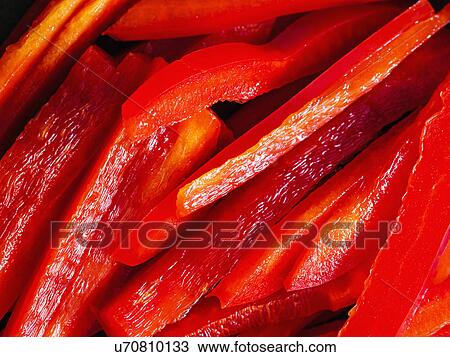 Stock Image - Close up of sliced red bell pepper. Fotosearch