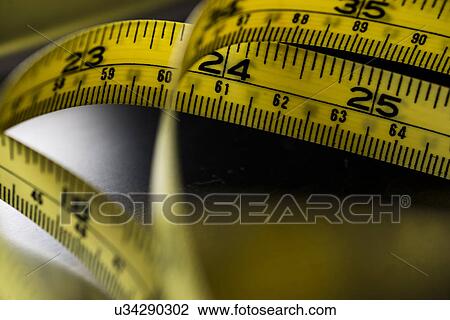 Stock Image - Close-up of tape measure. Fotosearch