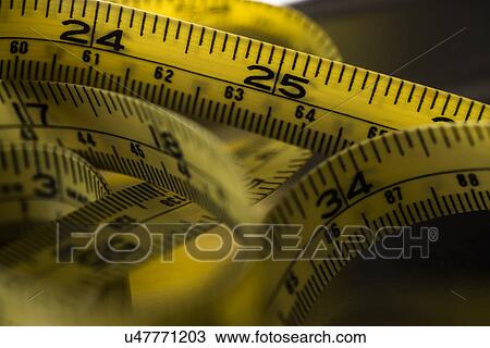 Close-up of tape measure View Large Photo Image Stock Image - Close-up of tape measure. Fotosearch