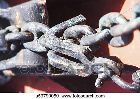 Stock Image - Close-up view of chain and hook. Fotosearch
