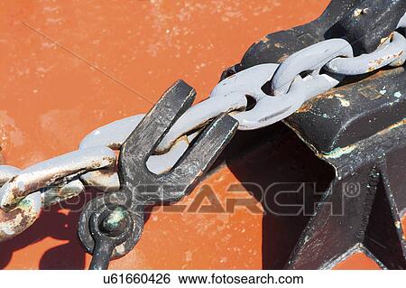 Stock Photograph - Close-up view of chain with hook. Fotosearch