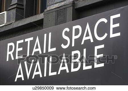 Stock Photo - Close-up view of rental sign on building facade. Fotosearch