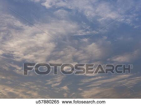 Stock Photography - Cloudscape at sunset. Fotosearch