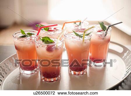 Cocktails garnished with mint View Large Photo Image Stock Image - Cocktails garnished with mint. Fotosearch