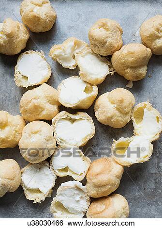 Stock Photograph - Cream filled profiteroles. Fotosearch