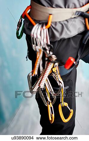 Cropped close up of carabiners on climbers harness View Large Photo Image Picture - Cropped close up of carabiners on climbers harness. Fotosearch