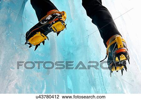 Cropped view of ice climbers feet wearing crampons View Large Photo Image Stock Image - Cropped view of ice climbers feet wearing crampons. Fotosearch