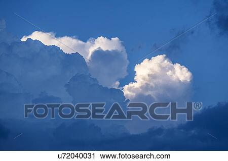 Cumulus clouds on sky View Large Photo Image Stock Image - Cumulus clouds on sky. Fotosearch