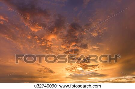 Dramatic sunset sky View Large Photo Image Stock Image - Dramatic sunset sky. Fotosearch