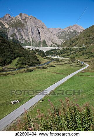 Elevated view of rural road and mountains in Formazza valley, Piedmont, Italy View Large Photo Image Picture - Elevated view of rural road and mountains in Formazza valley, Piedmont, Italy. Fotosearch