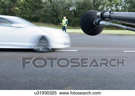 Engineer measuring vehicle sound level at test track View Large Photo Image Stock Photography - Engineer measuring vehicle sound level at test track. Fotosearch