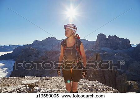 Female hiker arriving on Paternkofel mountain peak, Dolomites, Sexten, South Tyrol, Italy View Large Photo Image Stock Photography - Female hiker arriving on Paternkofel mountain peak, Dolomites, Sexten, South Tyrol, Italy. Fotosearch