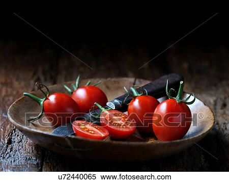 Stock Photography - Fresh organic fruit, Lancashire jester tomatoes. Fotosearch