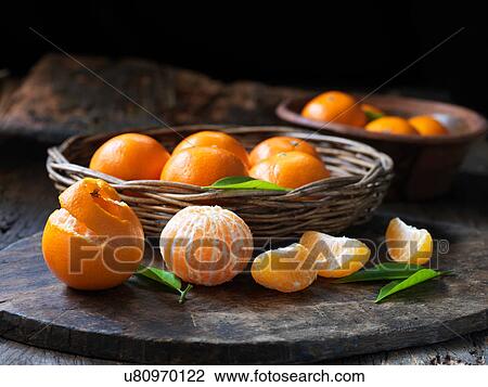 Fresh organic fruit, seedless tangerines with leaves View Large Photo Image Stock Image - Fresh organic fruit, seedless tangerines with leaves. Fotosearch