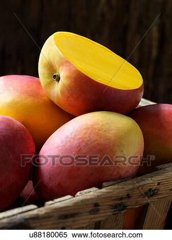 Stock Photography - Fresh organic fruit, speciality mango. Fotosearch