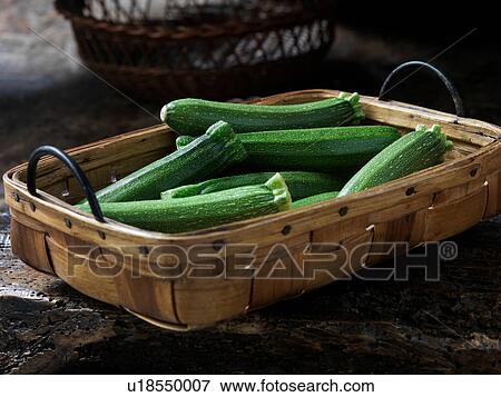 Fresh organic vegetables, baby long courgettes View Large Photo Image Stock Photo - Fresh organic vegetables, baby long courgettes. Fotosearch