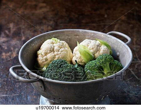 Picture - Fresh organic vegetables, baby cauliflower and broccoli. Fotosearch
