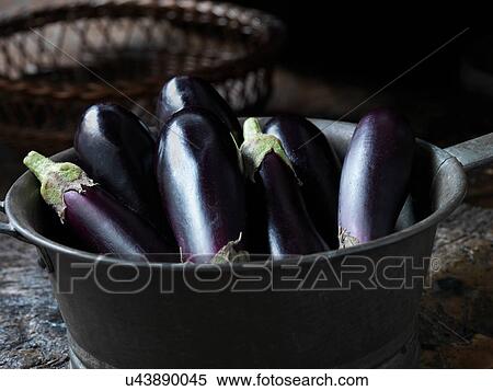 Fresh organic vegetables, oblong baby aubergines View Large Photo Image Stock Photography - Fresh organic vegetables, oblong baby aubergines. Fotosearch