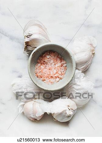 Garlic bulbs and pink sea salt in bowl View Large Photo Image Stock Image - Garlic bulbs and pink sea salt in bowl. Fotosearch