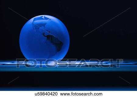 Stock Image - Globe on chess board. Fotosearch