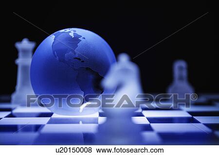 Stock Photo - Globe on chess board. Fotosearch