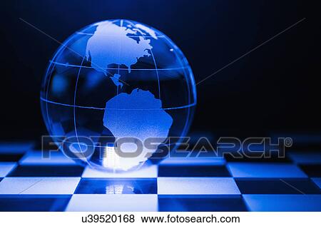 Stock Photo - Globe on chess board. Fotosearch