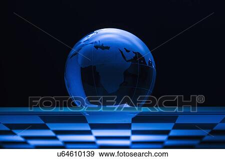 Stock Photo - Globe on chess board. Fotosearch