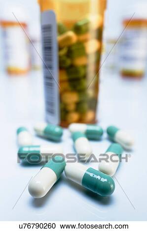 Green and white colour capsule pills View Large Photo Image Stock Image - Green and white colour capsule pills. Fotosearch