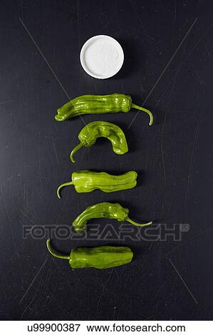 Green Shishito Peppers and salt in ramekin View Large Photo Image Stock Photo - Green Shishito Peppers and salt in ramekin. Fotosearch