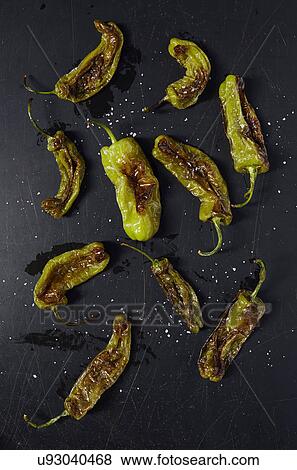 Grilled green Shishito Peppers View Large Photo Image Stock Photo - Grilled green Shishito Peppers. Fotosearch