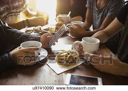 Group of friends in cafe View Large Photo Image Stock Image - Group of friends in cafe. Fotosearch