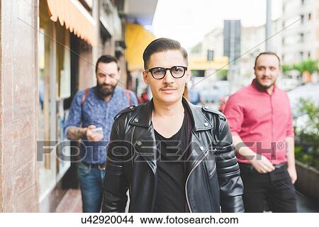 Group of friends walking on sidewalk View Large Photo Image Picture - Group of friends walking on sidewalk. Fotosearch