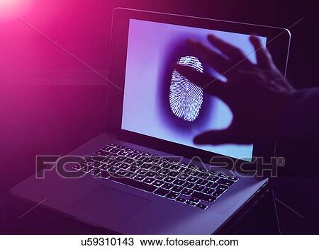 Stock Image - Hand grabbing the personnel identity of somebody online. Fotosearch