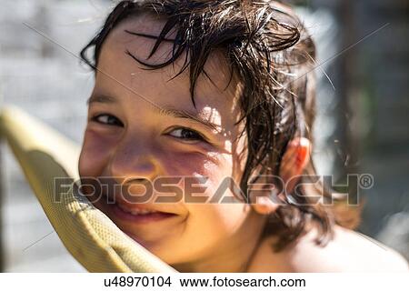 Picture - Happy boy on summer day. Fotosearch