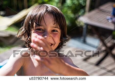 Picture - Happy boy on summer day. Fotosearch