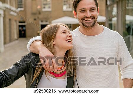 Happy young couple on Kings Road, London, UK View Large Photo Image Stock Photography - Happy young couple on Kings Road, London, UK. Fotosearch