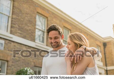 Happy young couple strolling on Kings Road, London, UK View Large Photo Image Stock Photography - Happy young couple strolling on Kings Road, London, UK. Fotosearch