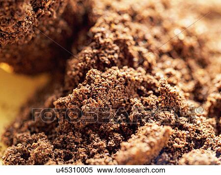 Stock Photography - Heap of brown ground coffee. Fotosearch