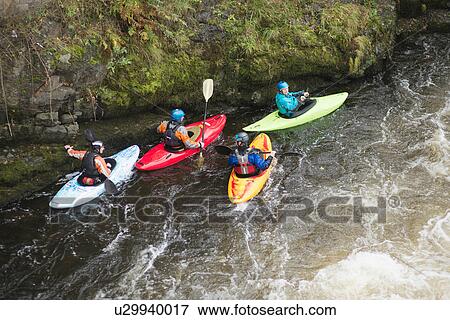 High angle view of kayakers on River Dee rapids, Llangollen, North Wales View Large Photo Image Stock Photo - High angle view of kayakers on River Dee rapids, Llangollen, North Wales. Fotosearch