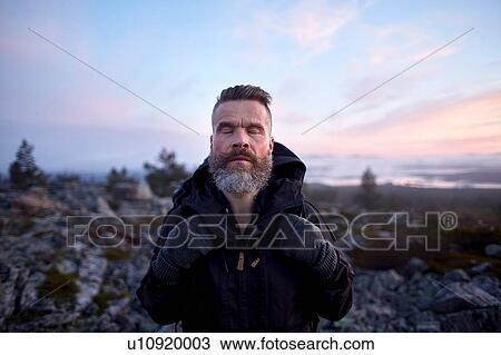 Hiker enjoying nature with eyes closed, Sarkitunturi, Lapland, Finland View Large Photo Image Stock Image - Hiker enjoying nature with eyes closed, Sarkitunturi, Lapland, Finland. Fotosearch