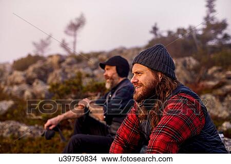 Hikers enjoying view on rocky field, Sarkitunturi, Lapland, Finland View Large Photo Image Picture - Hikers enjoying view on rocky field, Sarkitunturi, Lapland, Finland. Fotosearch