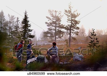 Hikers relaxing in park, Sarkitunturi, Lapland, Finland View Large Photo Image Stock Photo - Hikers relaxing in park, Sarkitunturi, Lapland, Finland. Fotosearch